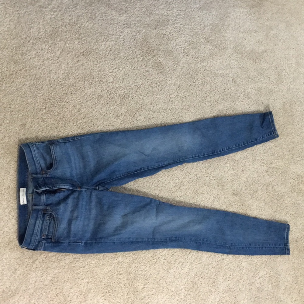 Mid rise, medium wash jeans
